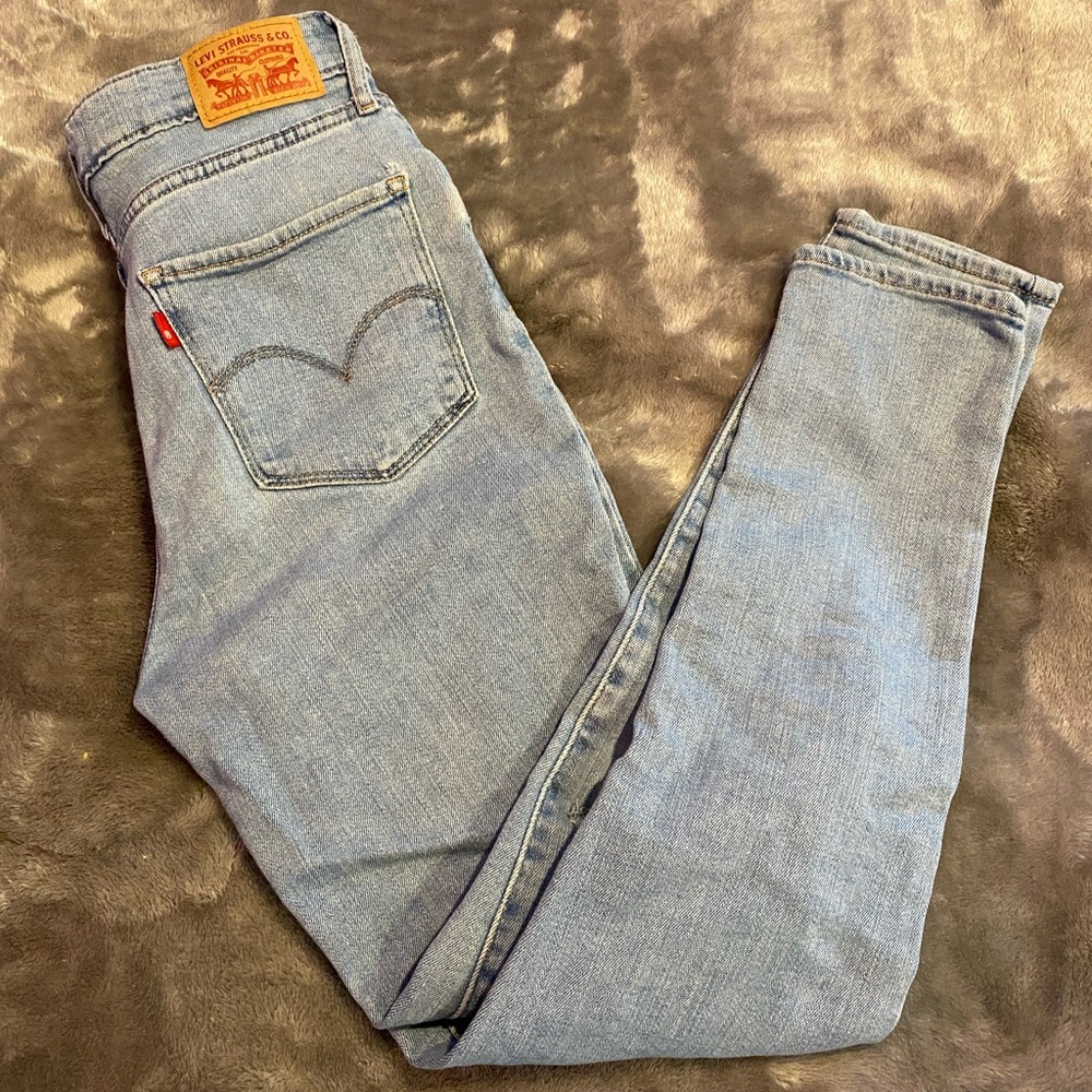 Levi’s Blue High-Rise Skinny Jean With Rips
